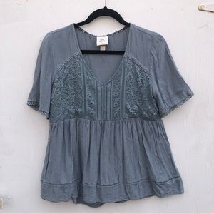 Free w purchase: Flowy peplum top with lace detail